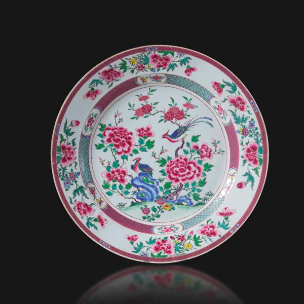 Famille rose porcelain plate depicting phoenixes with floral decoration, China, Qing Dynasty, Qianlong period (1736–1796).