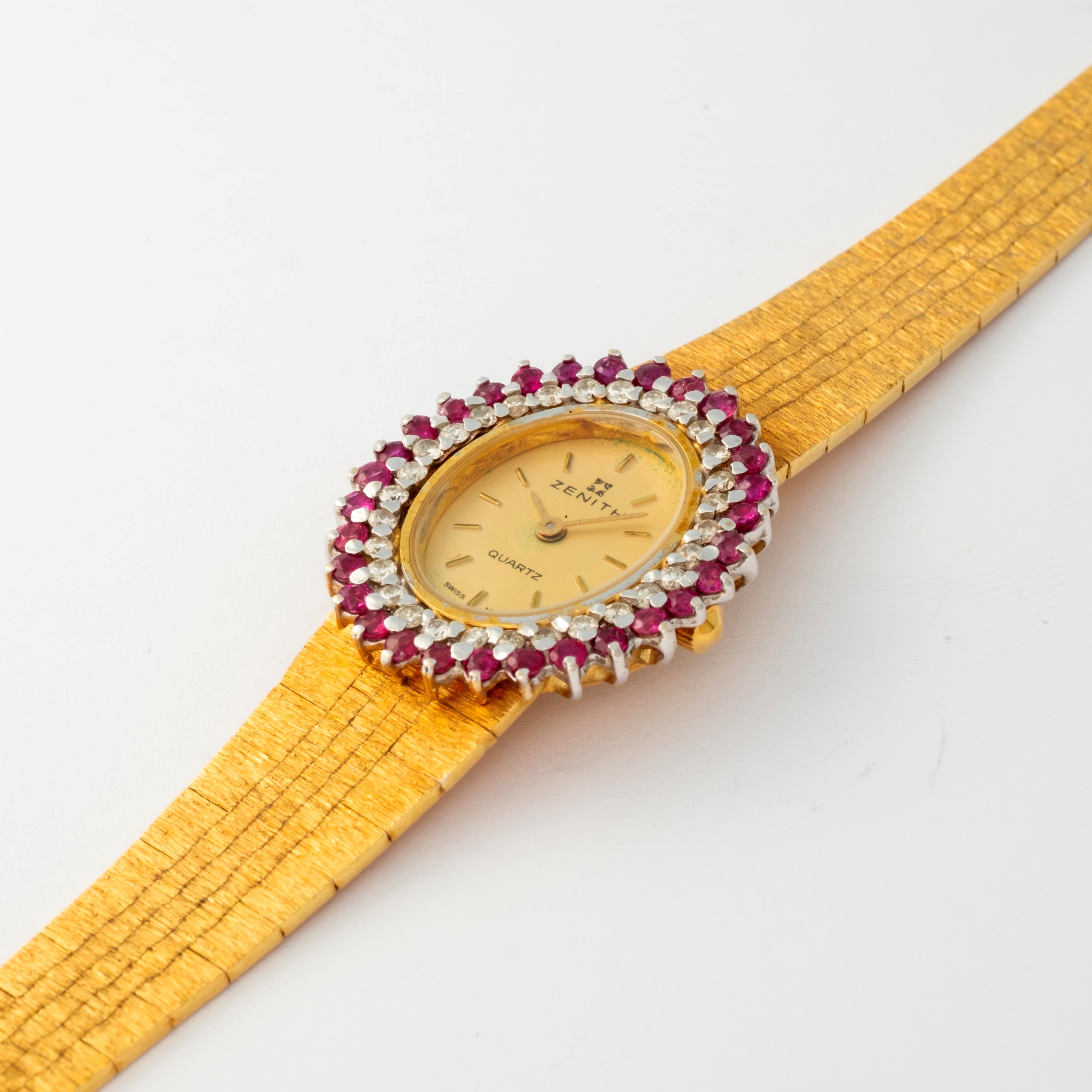 Zenith - Lady in oro giallo 18k con quadrante champagne, diamanti e rubini, circa 1970