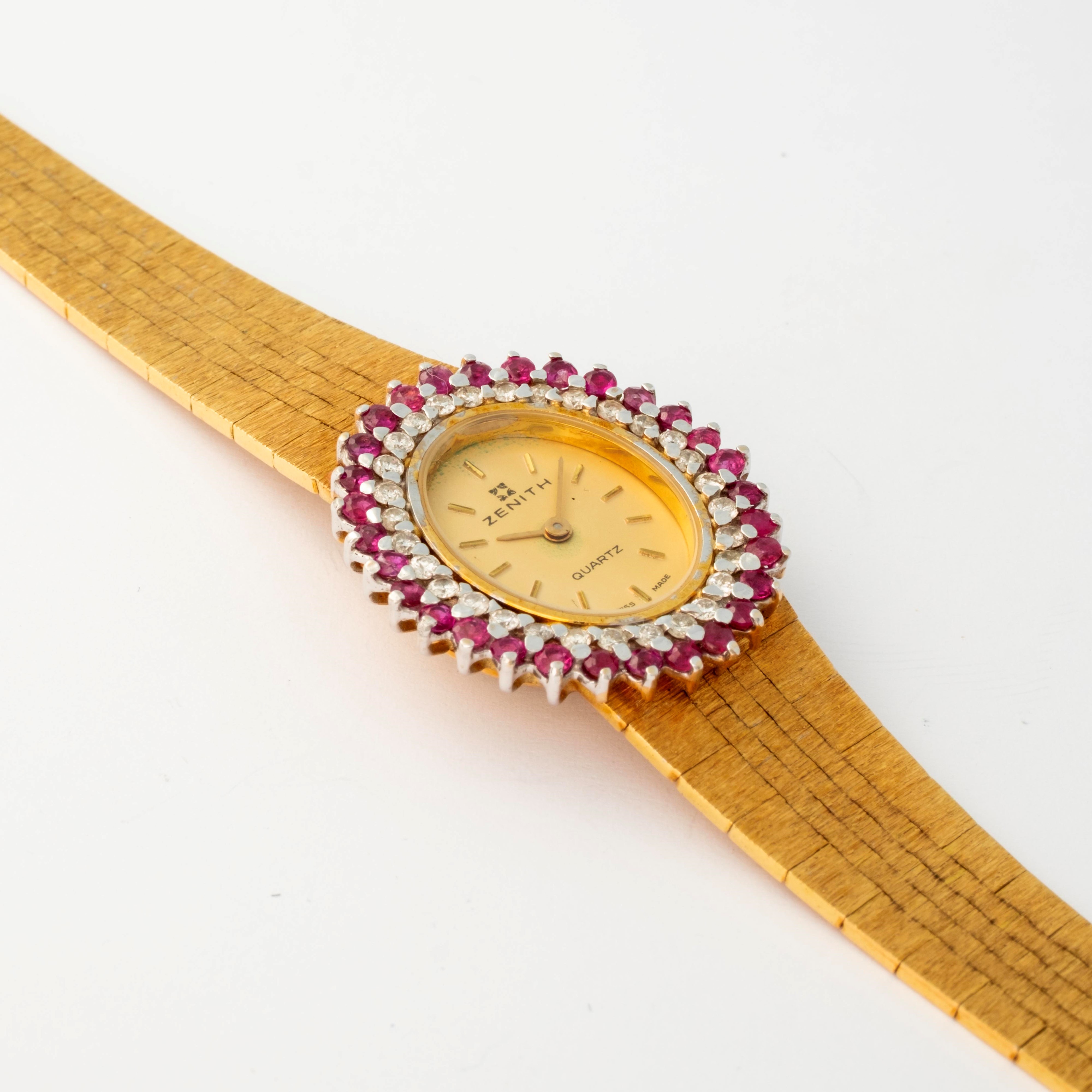 Zenith - Lady in oro giallo 18k con quadrante champagne, diamanti e rubini, circa 1970