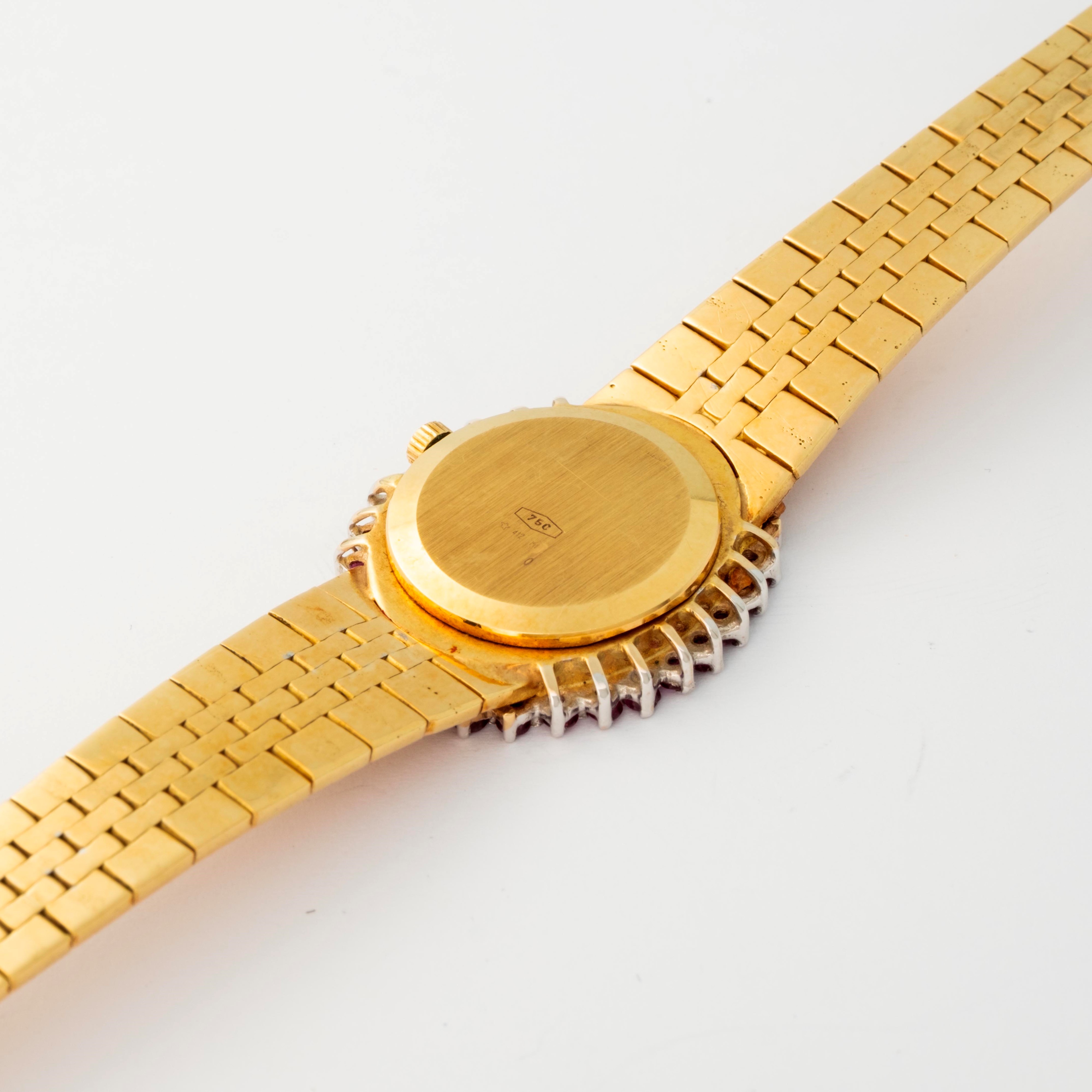 Zenith - Lady in oro giallo 18k con quadrante champagne, diamanti e rubini, circa 1970