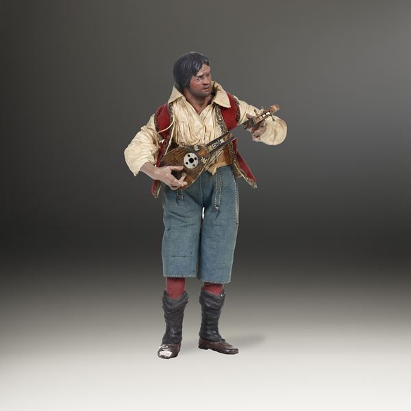 Suonatore di mandolino. Arte presepiale napoletana del XIX secolo