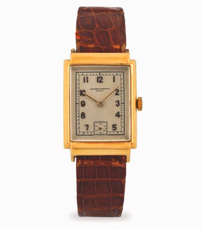 Orologio rettangolare in oro giallo 18k con quadrante argentèe, circa 1940