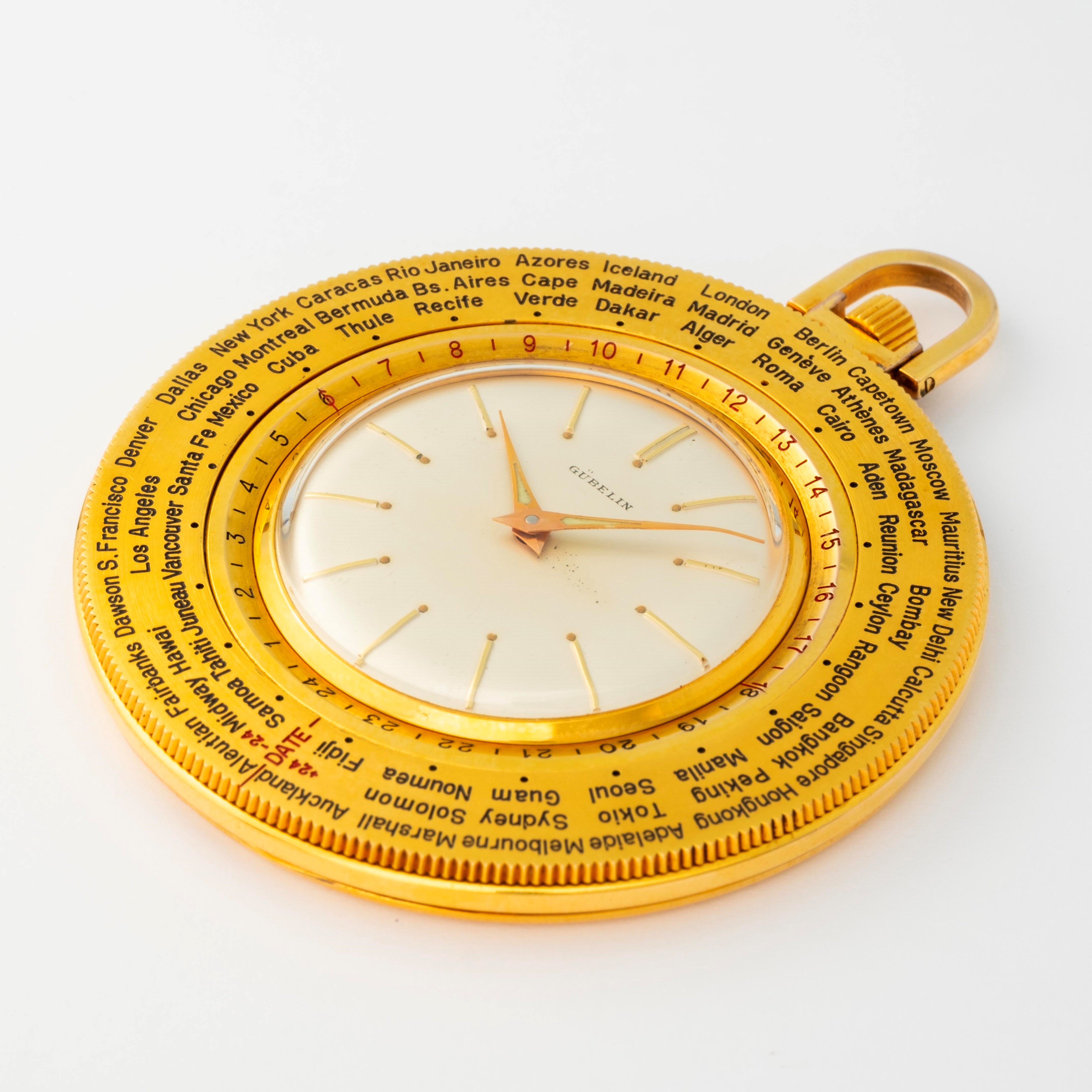 Gübelin - Tasca 'World time' in ottone dorato con quadrante argenté e ghiera girevole per 24 fusi...