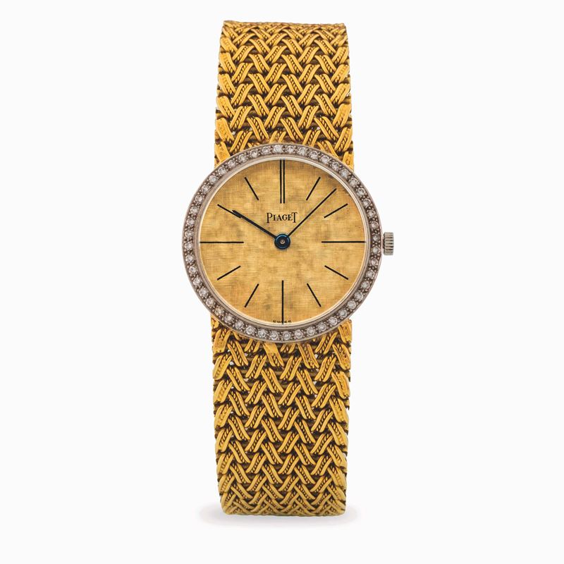 Piaget : Lady Diamonds in oro giallo 18k con diamanti e bracciale integrato, quadrante champagne inciso, circa 1970  - Asta Orologi da Polso - Cambi Casa d'Aste