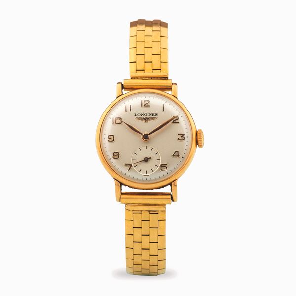 Longines - Ladies’ time-only watch in yellow gold 18k with bracelet, silvered dial with small seconds at six and applied indexes, circa 1970