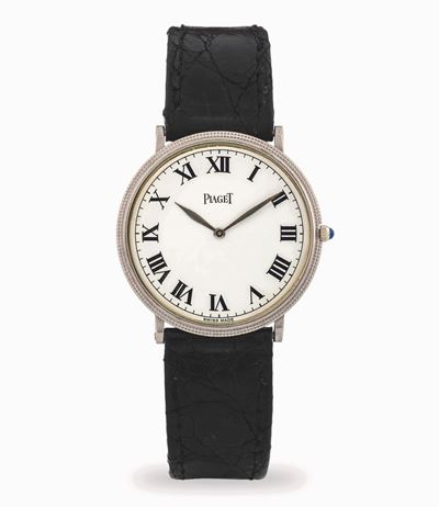 Extrapiatto in oro bianco 18k con quadrante bianco e numeri romani (circa 1980)