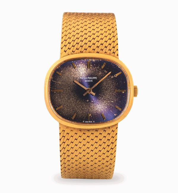 Patek Philippe - Ellipse ref. 3545 in oro giallo 18k con bracciale integrato Gay Frères, quadrante blu "Tropical" e indici applicati, circa 1980