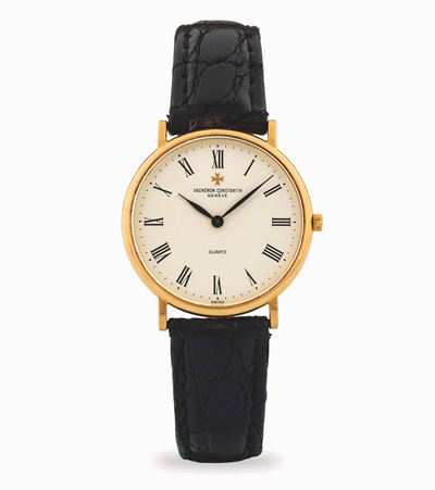 Orologio Patrimony in oro giallo 18k con quadrante bianco e indici romani, circa 1990