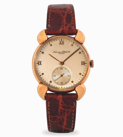 Orologio 'Diavoletto' in oro giallo 18k, quadrante argenté, circa 1950