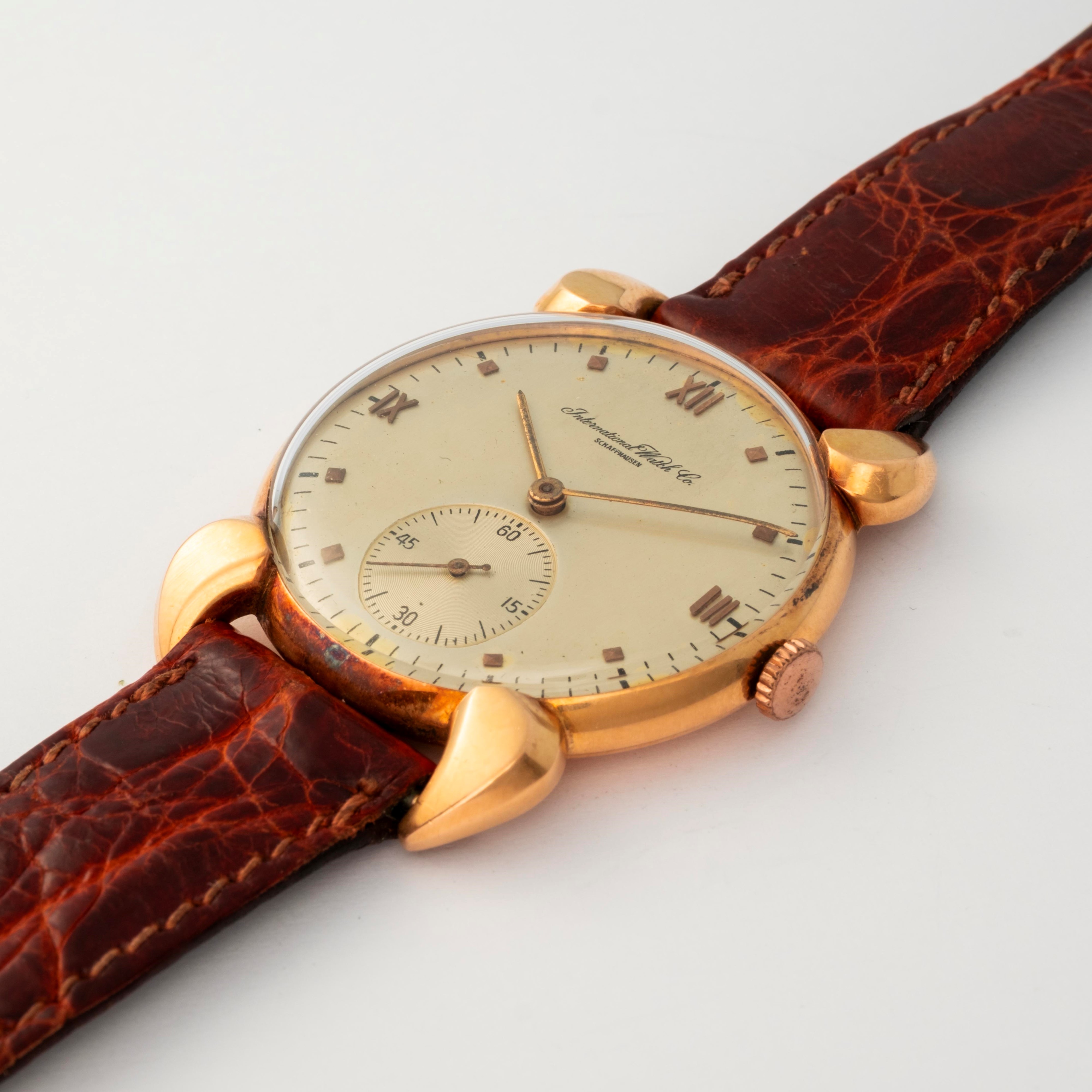 Iwc - Orologio 'Diavoletto' in oro giallo 18k, quadrante argenté, circa 1950