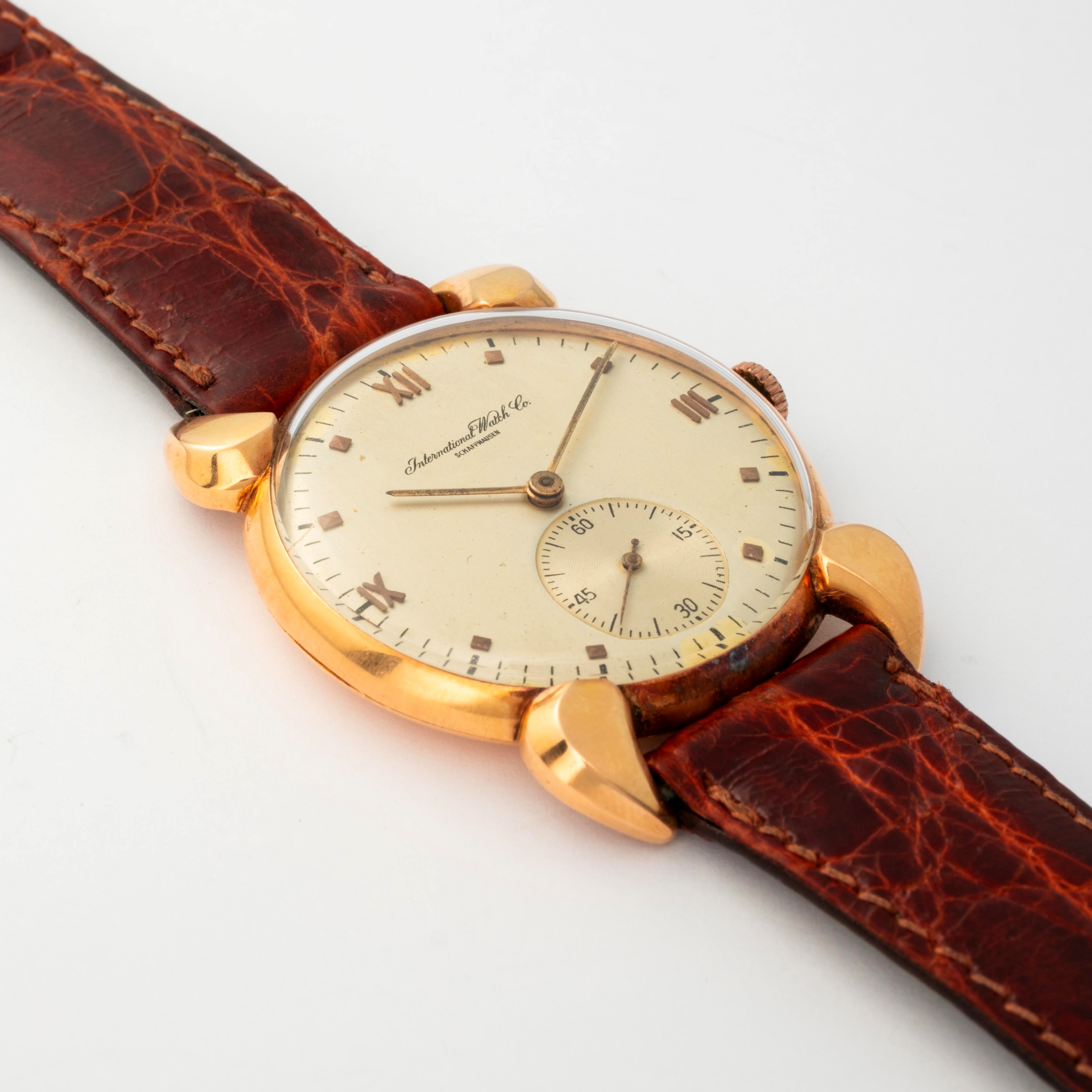 Iwc - Orologio 'Diavoletto' in oro giallo 18k, quadrante argenté, circa 1950