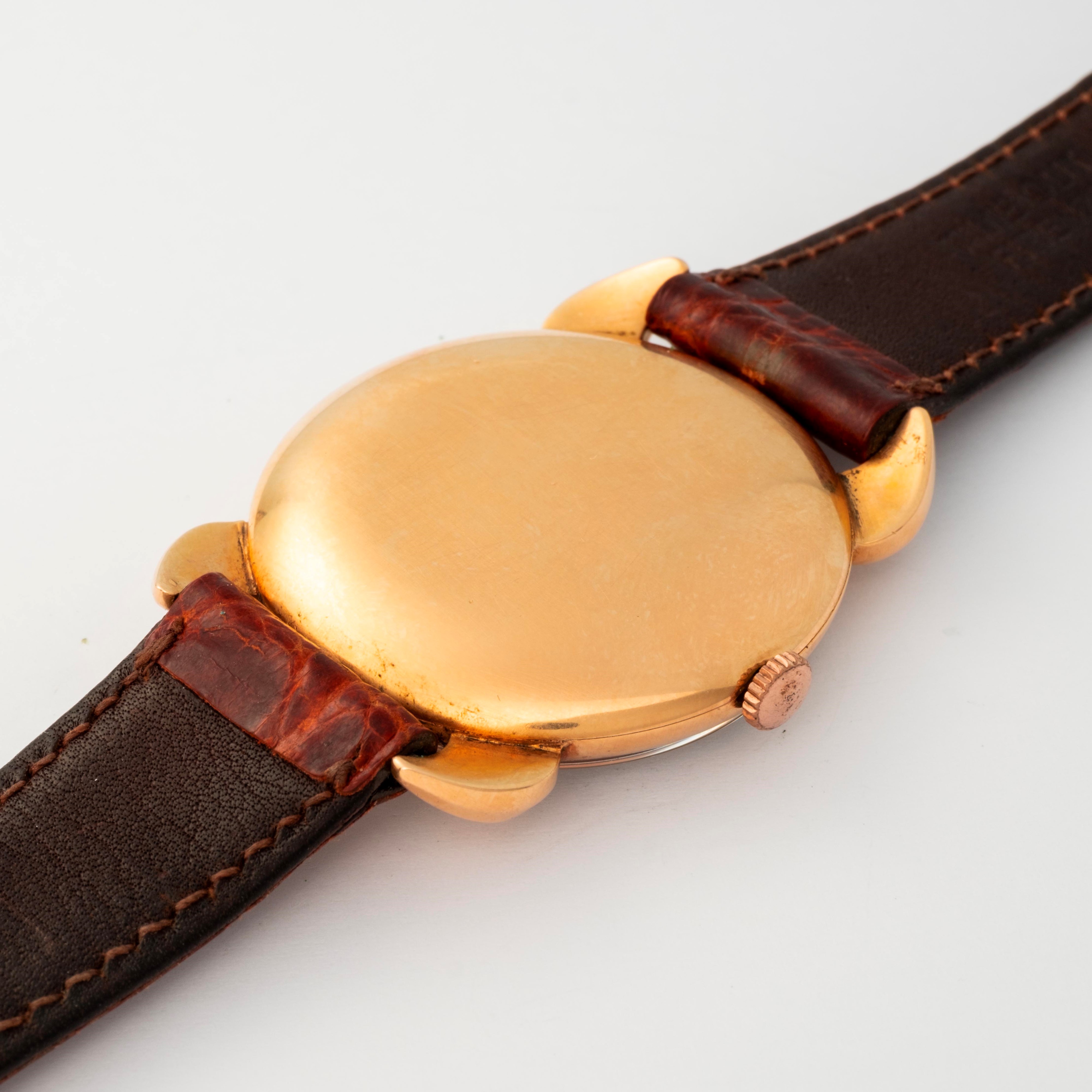 Iwc - Orologio 'Diavoletto' in oro giallo 18k, quadrante argenté, circa 1950