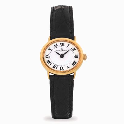 Orologio ovale in oro giallo 18k con quadrante bianco a numeri romani, circa 1980