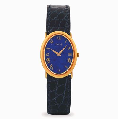 Orologio Ovale in oro giallo 18k con quadrante in Lapis e indici romani, circa 1980
