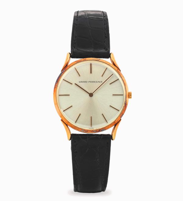 Extrapiatto in oro giallo 18k, quadrante argentè con indici applicati, circa 1970