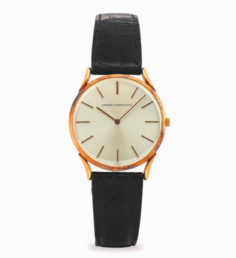 Girard Perregaux : Extrapiatto in oro giallo 18k, quadrante argentè con indici applicati, circa 1970  - Asta Orologi da Polso - Cambi Casa d'Aste