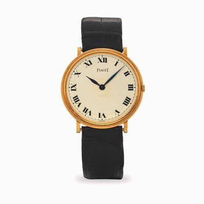 Orologio Extrapiatto referenza 9021, oro giallo 18k, quadrante argentè con numeri romani, circa 1...