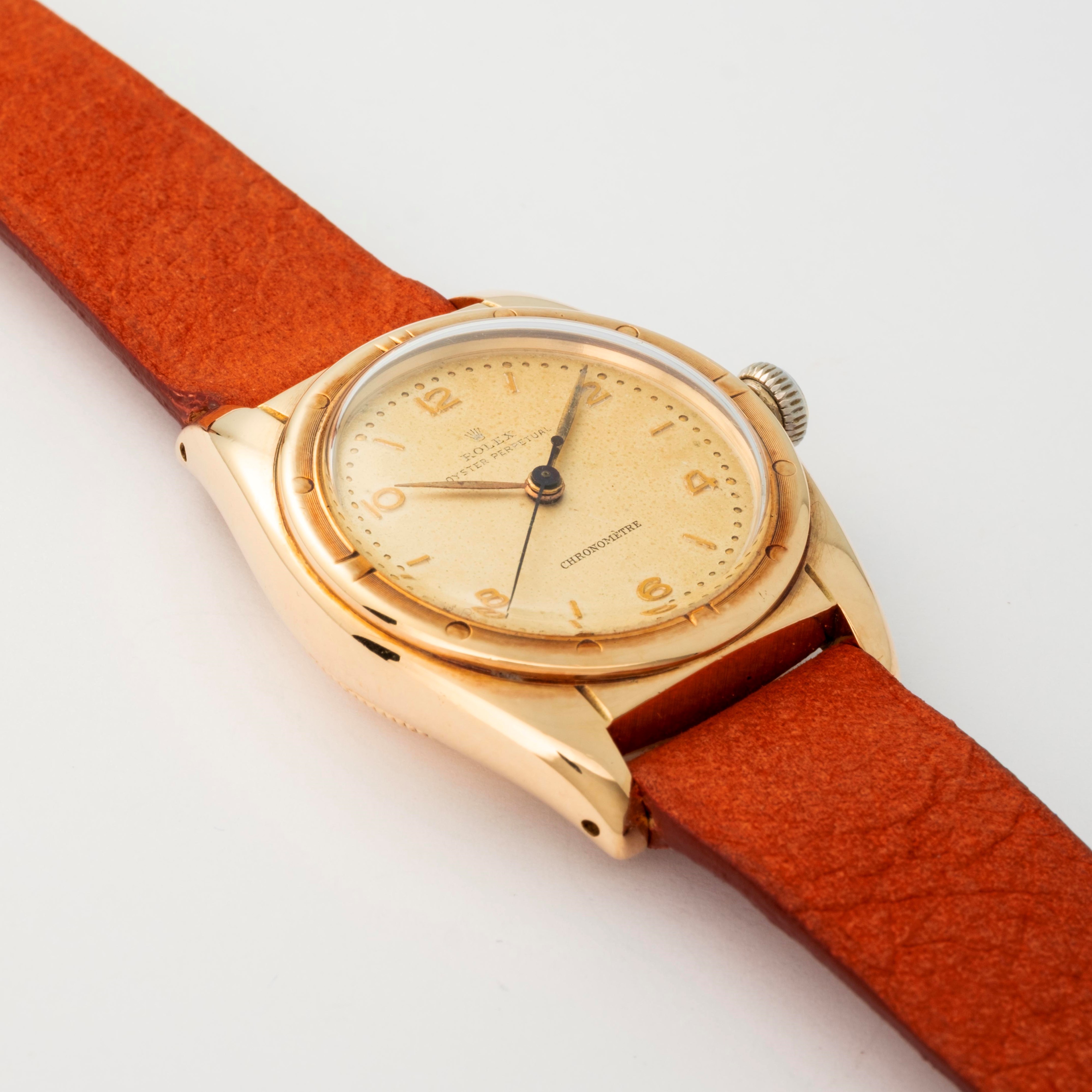 Rolex - Ovetto ref. 5015 in oro giallo 14k con quadrante grenè, circa 1948