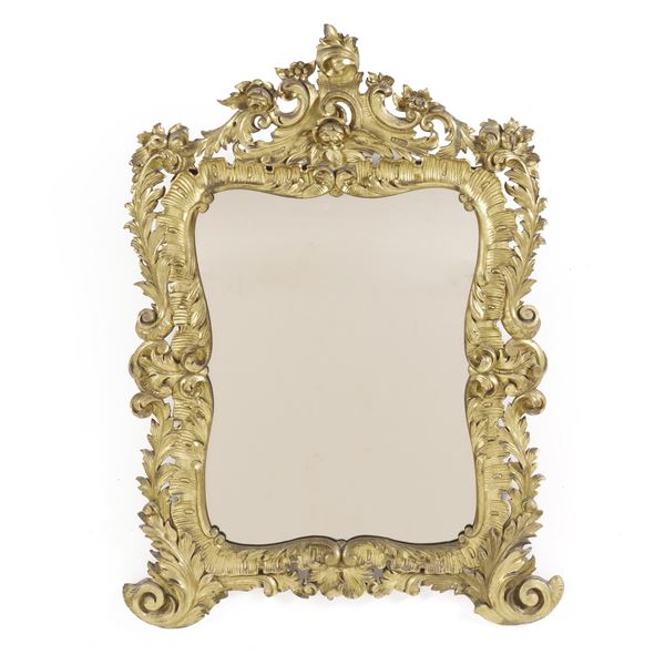 Specchiera in legno intagliato e dorato