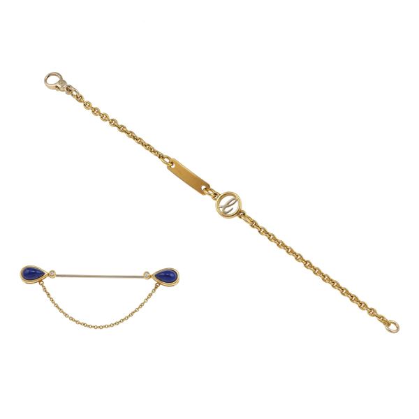 Lotto composto da un bracciale e una spilla con piccoli diamanti e lapislazzuli tinti