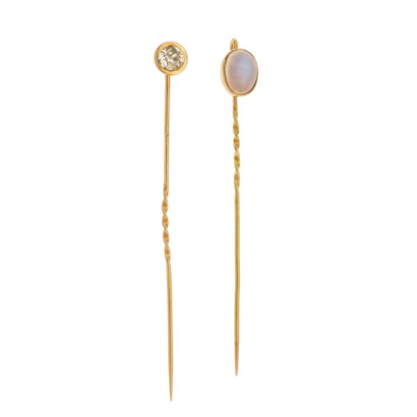 Two diamond, clair de lune and gold pins