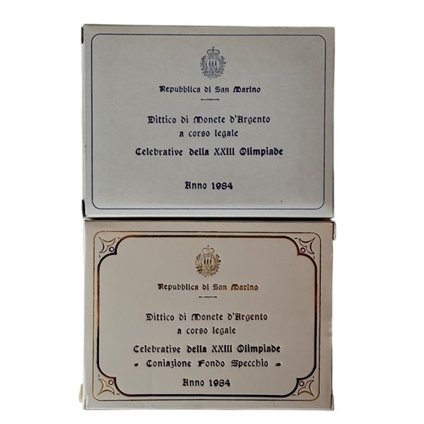 San Marino 1984: 2 dittici celebrativi del XXIII Olimpiade, contenente quattro monete, di cui 2 FdC e 2 Fondo Specchio in argento (2 X 500 + 2 X 1.000 Lire).