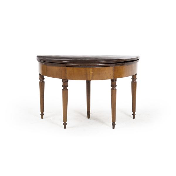 Tavolo a mezzaluna con piano apribile. XIX secolo