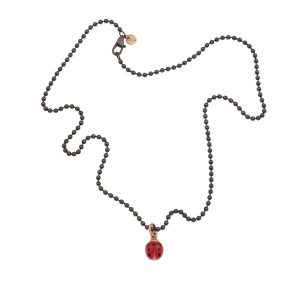 Enamel, low-karat gold pendant and PVD steel necklace. Marked Dodo