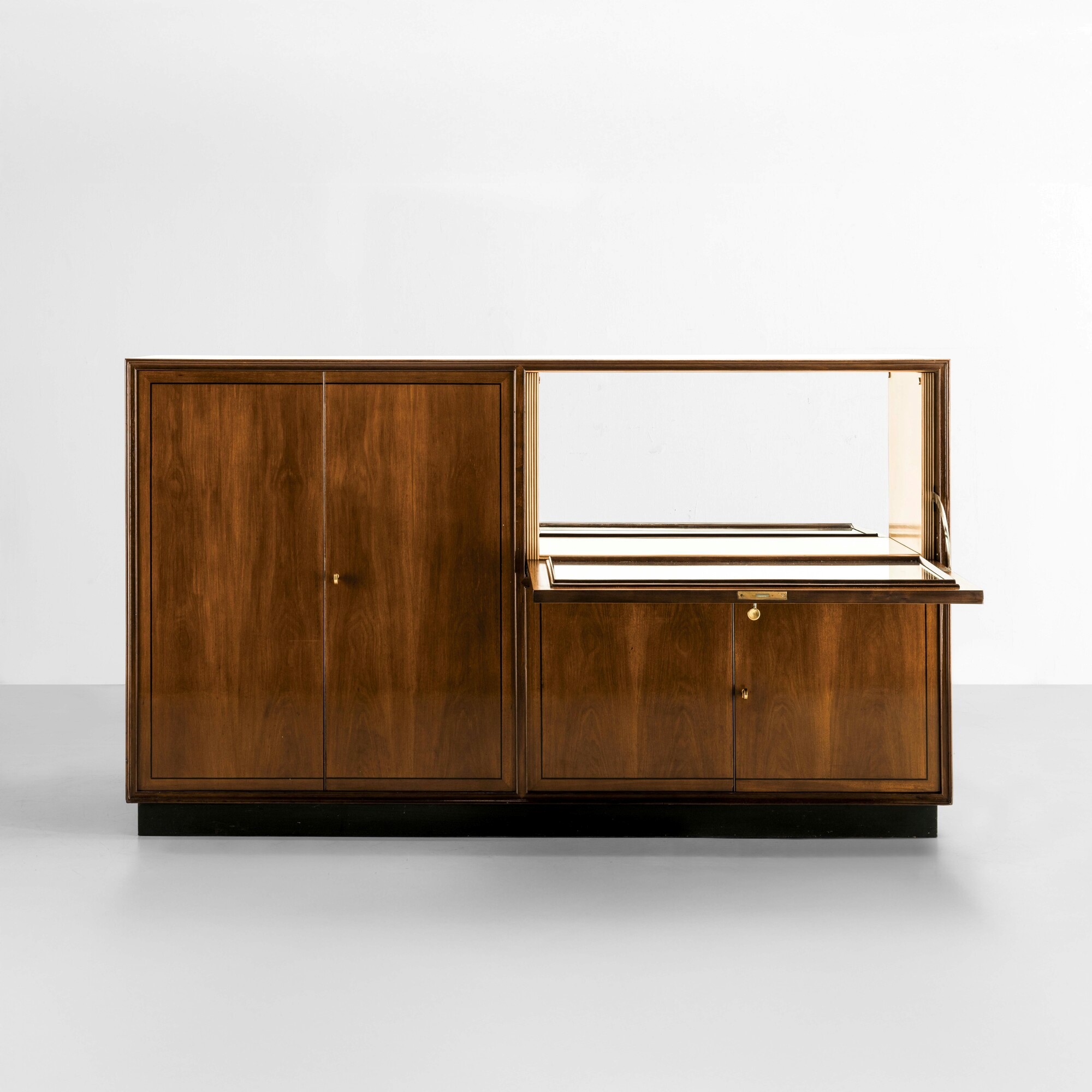 Mobile contenitore, legno impiallacciato ed ebanizzato con interno rivestito in cristallo specchi...