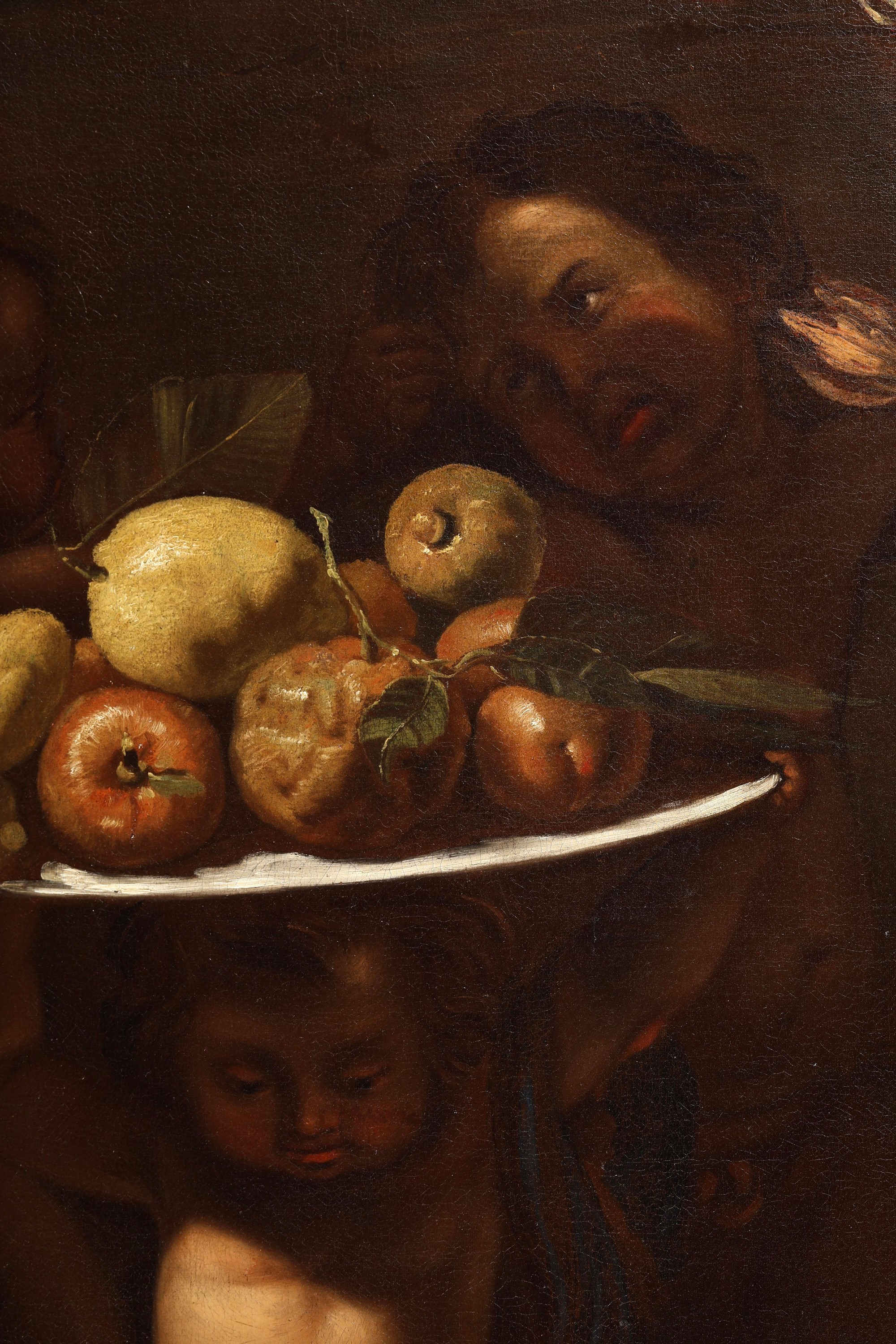 Scuola napoletana del XVII secolo, Natura morta con frutti, vaso fiorito e putti