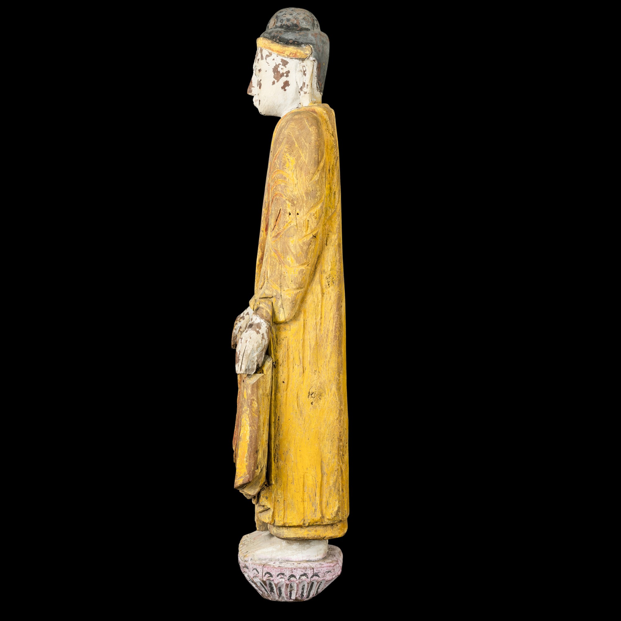 Figura di Buddha stante in legno con tracce di policromia, Birmania, XIX secolo