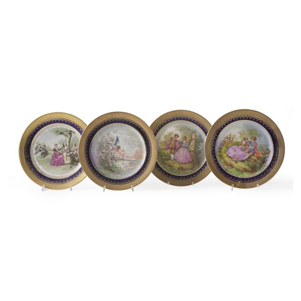 Quattro piatti in porcellana