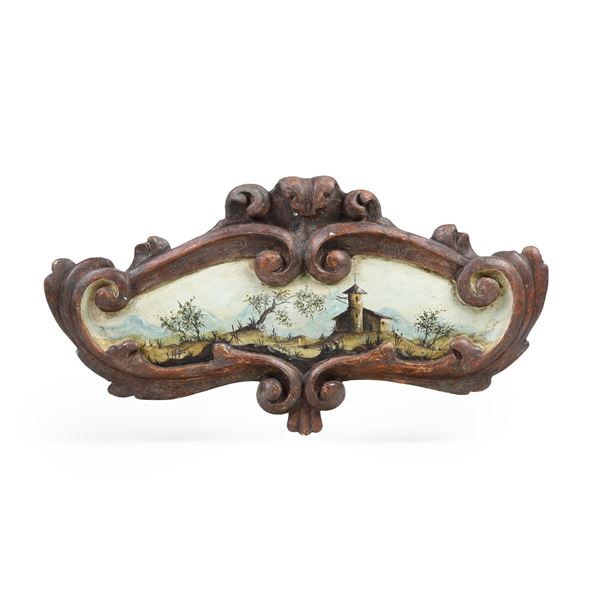 Due sovraporta in legno intagliato e dipinto. XVIII secolo