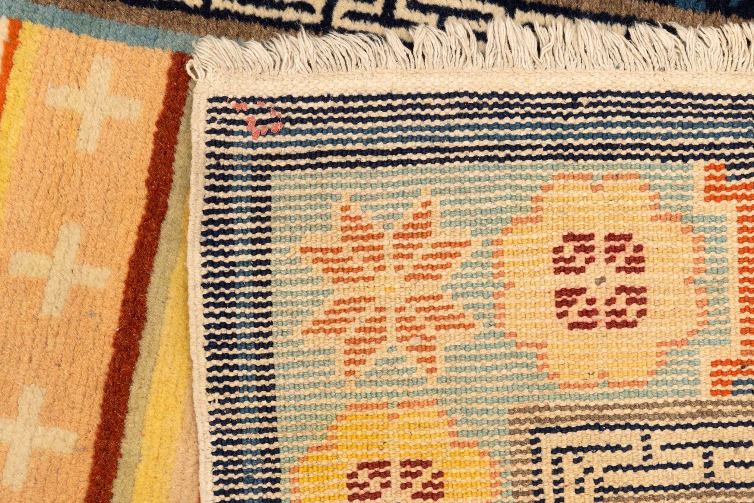 Tappeto, decori geometrici su fondo blu, Tibet, XIX secolo