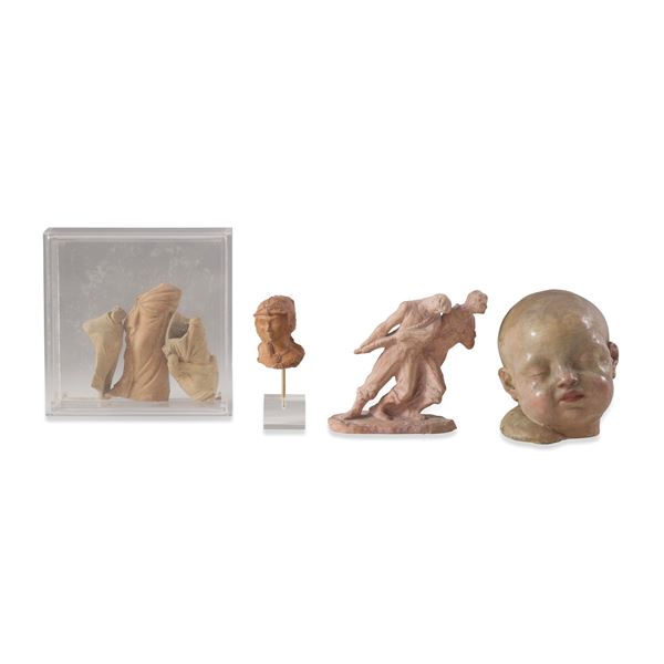 Due testine, un gruppo con figura maschile e femminile, tre imitazioni di frammenti classici