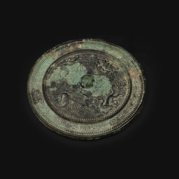 Specchio in bronzo raffigurante aironi e decori a rilievo, Cina, XX secolo