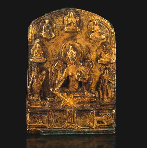 Gilt repoussé copper votive plaque depicting Tara with relief deities, Nepal, 16th century.