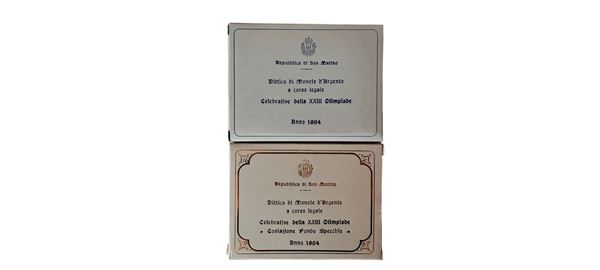 San Marino 1984: 2 dittici celebrativi della XXIII Olimpiade, contenente quattro monete, di cui 2 FdC e 2 Fondo Specchio in argento (3 X 500 + 4 X 1.000 Lire).