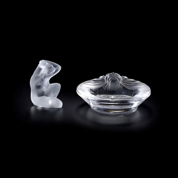 Posacenere e figurina. Francia, Manifattura Lalique, XX secolo.