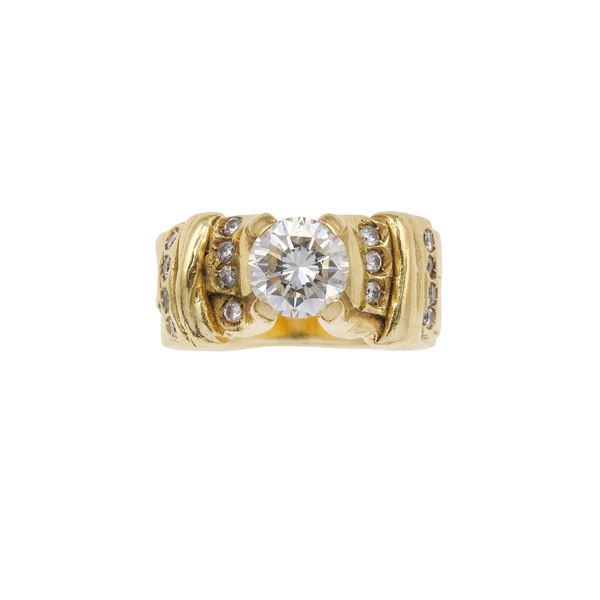 Brilliant-cut diamond and gold ring. Signed Misani