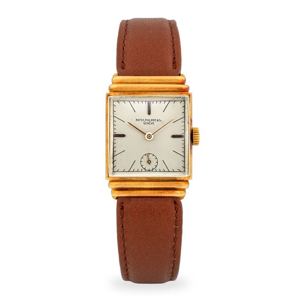 Patek Philippe - Art Decò "Hooded Lugs" in oro giallo 18k con anse incappucciate, quadrante argentè con piccoli secondi al sei, circa 1945