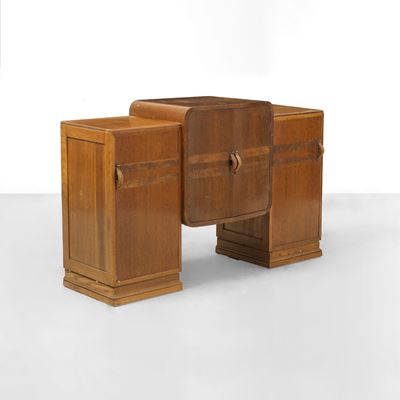Mobile contenitore, legno scolpito e impiallacciato, produzione 1980 ca.