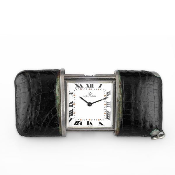 Orologio da viaggio, quadrante silver satinato con numeri Romani, carica manuale a cremagliera, con scatola e garanzia<BR>34x48 mm