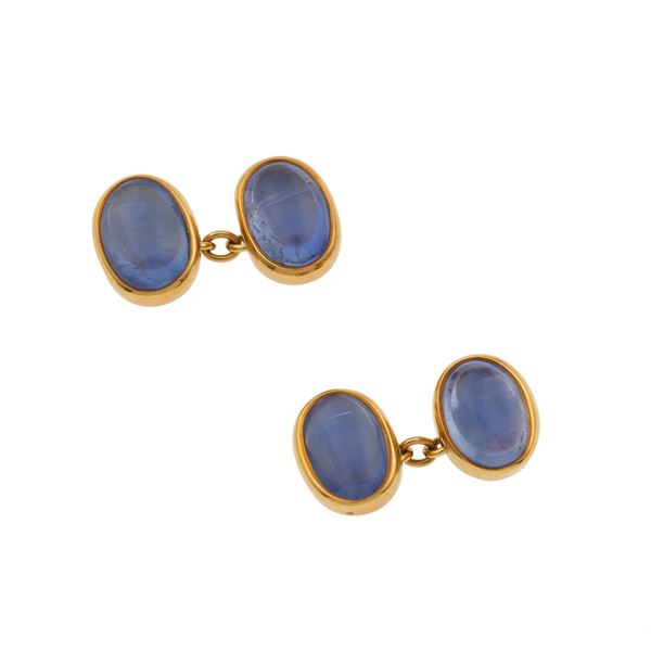 Pair of sapphire and gold cufflinks. Signed Bulgari. Fitted case