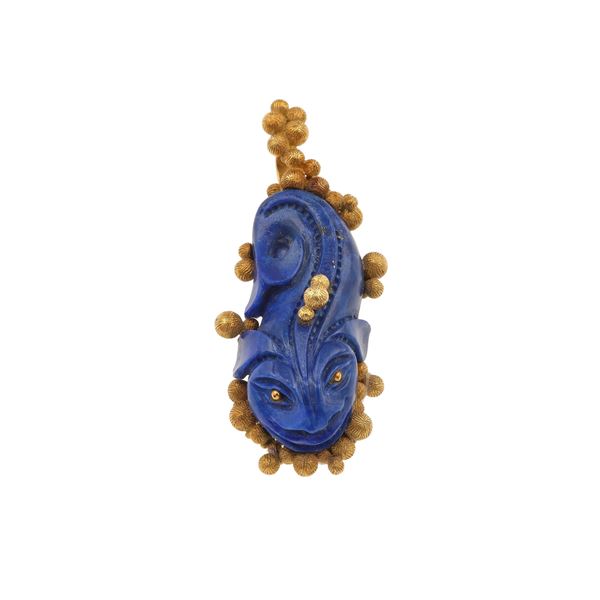Carved sodalite and gold pendent. Signed Grima. Pouch stamped Grima