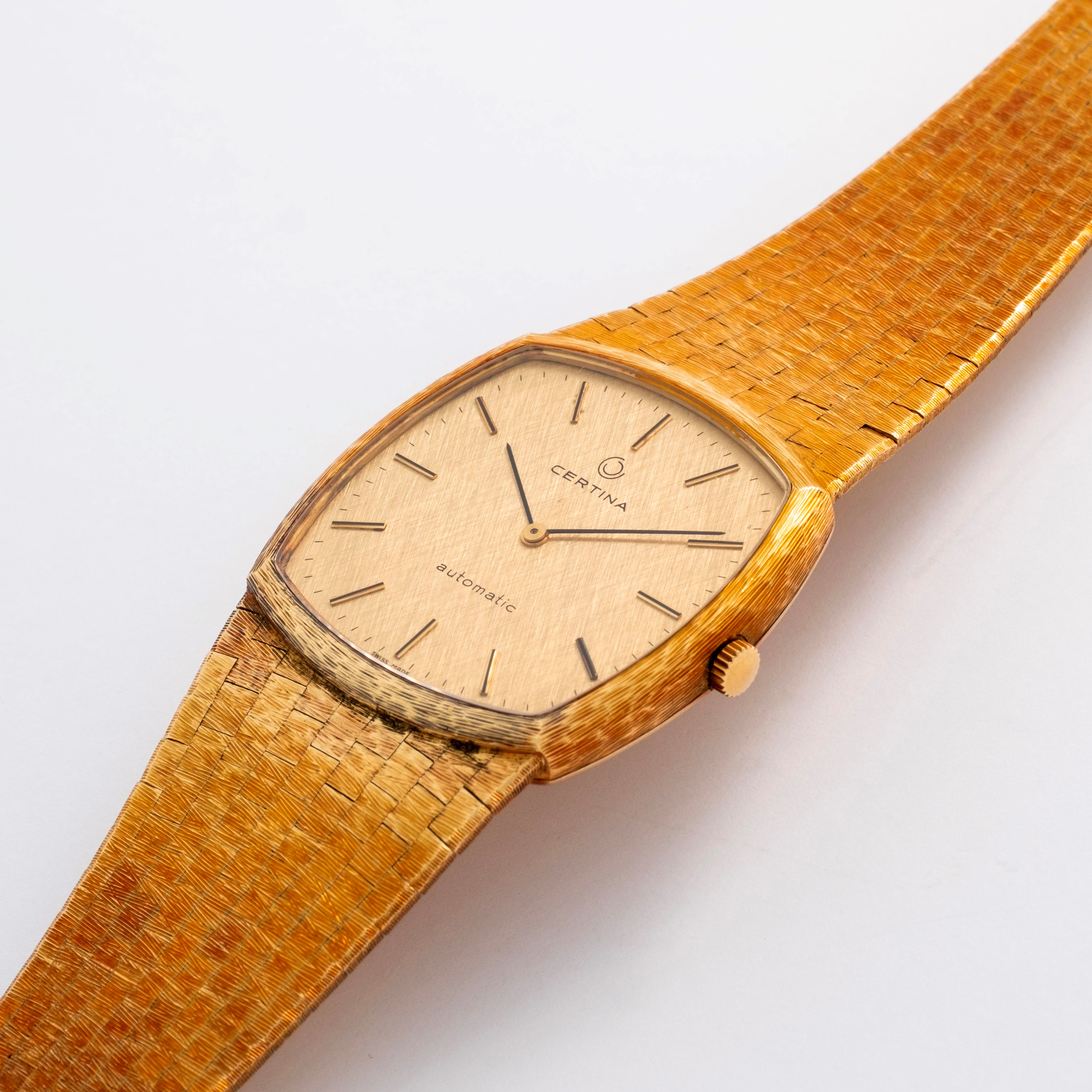 Certina - Orologio automatico in oro giallo 18k con bracciale integrato, circa 1970