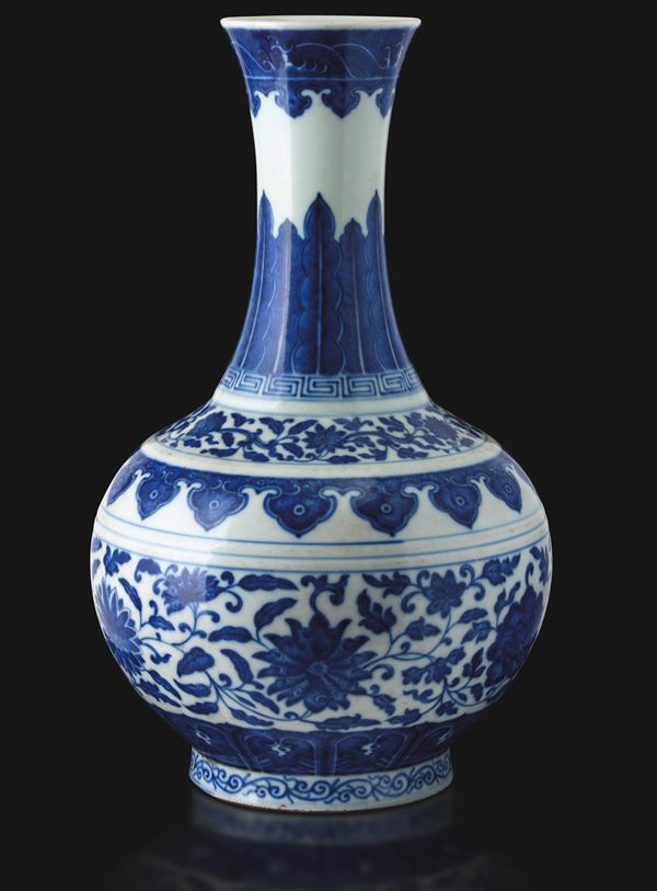 Blue and white porcelain vase in “Shang Ping” style with lotus flowers, ruyi fungus and flowering branches, China, Qing Dynasty, Jiaqing mark and period (1796–1820).