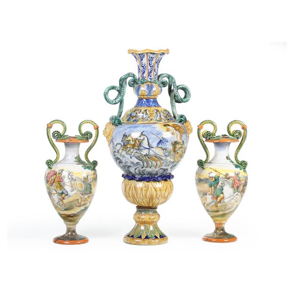 Una coppia di vasi biansati e uno più grande in ceramica invetriata. XX secolo