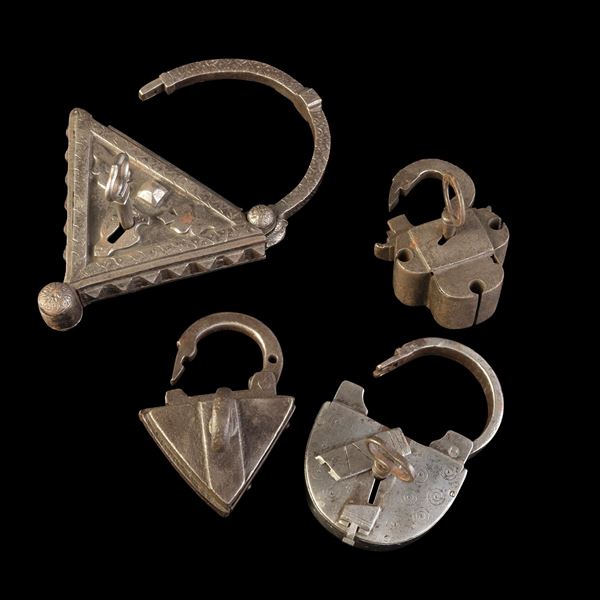 Quattro lucchetti in ferro battuto. Germania, XVII-XIX secolo