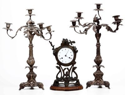 Coppia di candelabri, metallo dorato